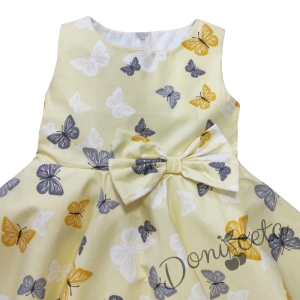 Детска рокля в нежен жълт цвят с пеперуди тип клош 