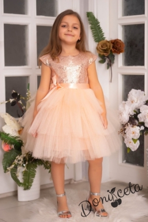 Детска официална рокля Хава в прасковено от пайети и тюл на пластове