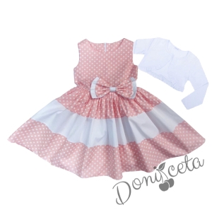 Комплект от детска рокля в прасковено на бели точки и болеро в бяло