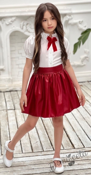 Детски комплект за момиче от риза с къс ръкав тип буфан в екрю с панделка и кожена пола в червено
