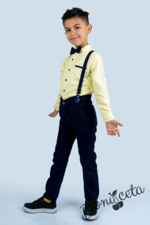 Set of shirt in yellow with ornaments, trousers, bow tie and suspenders in dark blue
