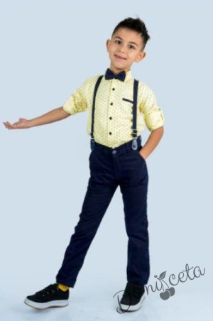 Set of shirt in yellow with ornaments, trousers, bow tie and suspenders in dark blue