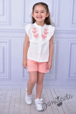 Комплект за момиче от риза с пеперуди и къси панталони в прасковено 1