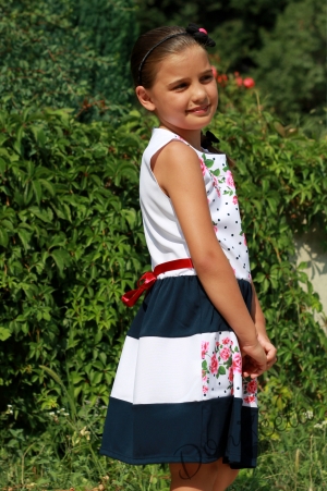 Детска рокля с цветя и с болеро в тъмносиньо