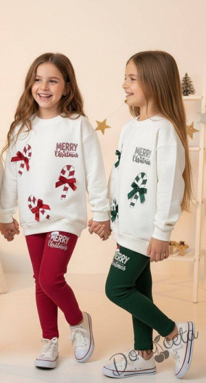 Коледен комплект за момиче от блуза в бяло с коледни мотиви и панделки и клин рипс в зелено