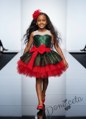 Коледна детска рокля с пайети в зелено с голяма панделка и тюл в червено с фиба за коса