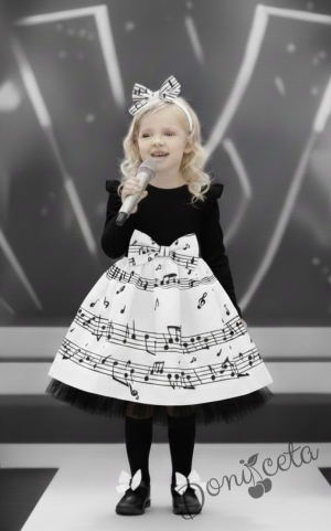 Детска рокля с дълъг ръкав в черно и бяло с ноти и тюл в долната част