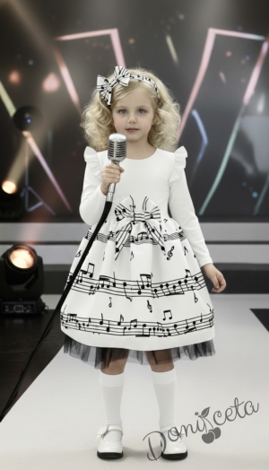 Детска рокля с дълъг ръкав в бяло с ноти и тюл в долната част