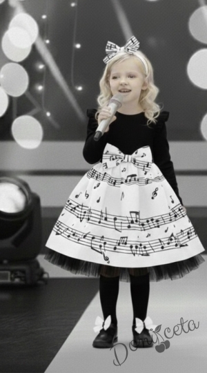 Детска рокля с дълъг ръкав в черно и бяло с ноти и тюл в долната част